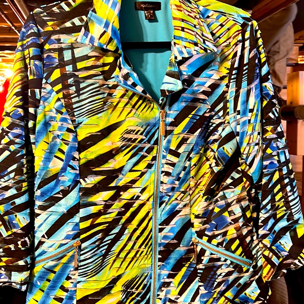 Mahtani vintage blazer. Blue, bright green.”, and black.